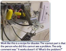 A picture of an electrical device with wires attached.